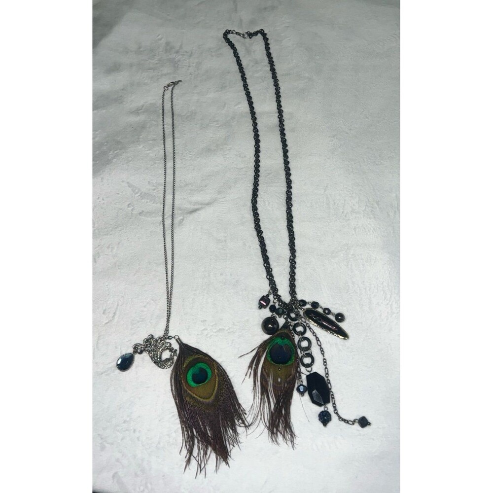 2 peacock themed necklaces- 1 missing a few gemstones